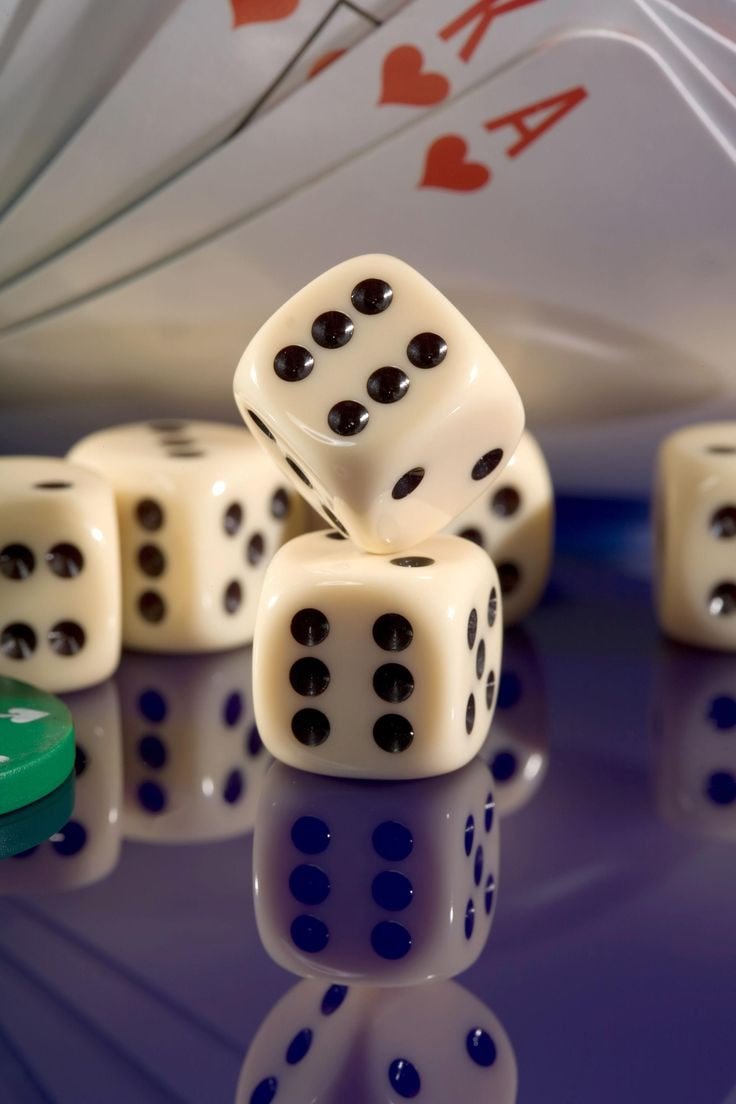 Roulette wheel spinning on Ikan Hoki with betting grid below